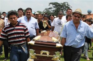 Relatives carry Viera's coffin. From http://www.utsandiego.com.