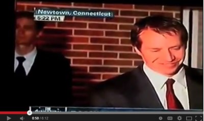 "Robbie Parker" laughs before making a concerted effort to appear sad the day after his daughter was allegedly murdered.