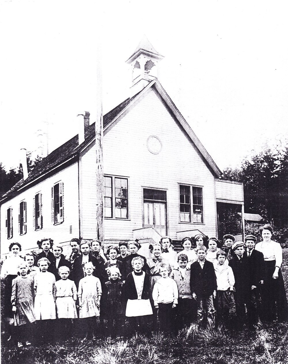 From the Skagit Valley Historical Museum. Pleasant Ridge School About 1911 or 1912. This is a larger version of the picture above. A second page listed the names of everyone in the picture in shaky script with the note "original from Grace Talin."