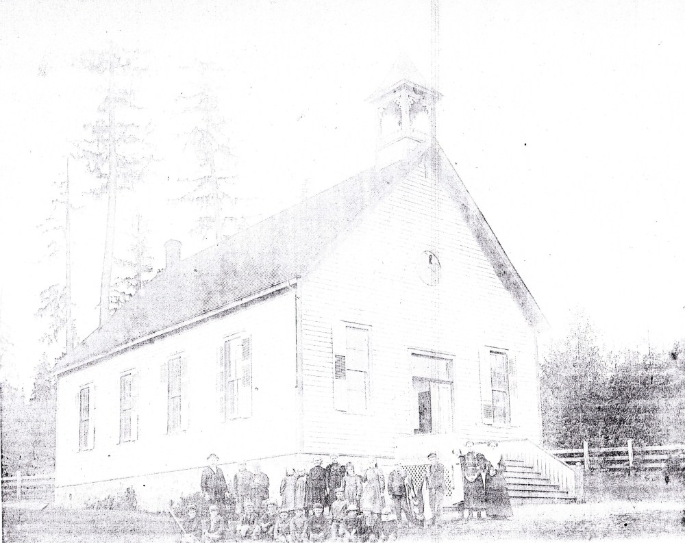 From the Skagit Valley Historical Museum, Courtesy Mrs. Nellie Anderson, Bow. Judging from the styles in this faint photo, it was probably taken between 1891 and 1910. 